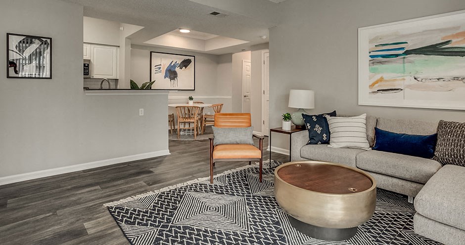 a living room with a couch and a table