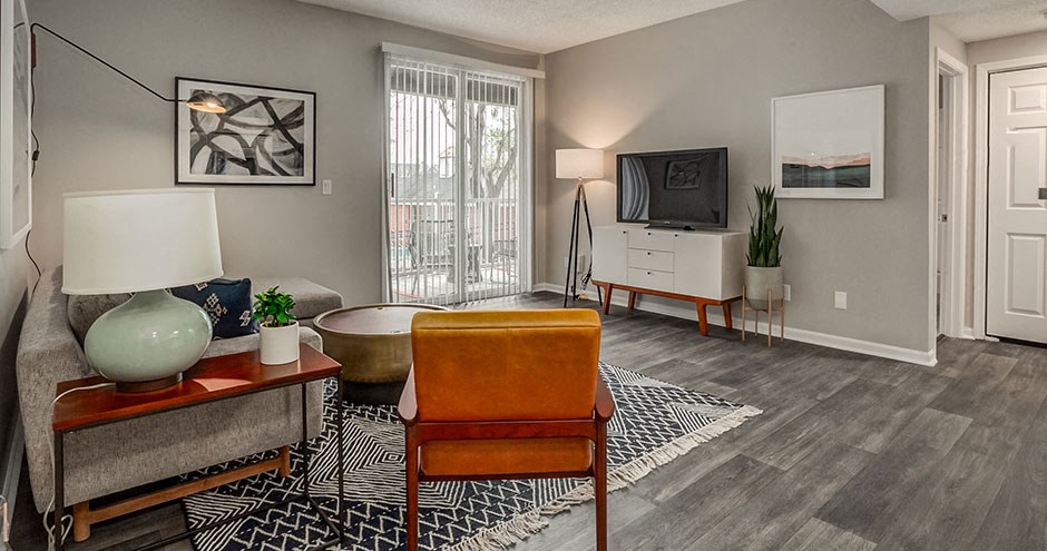a living room with a couch and a television