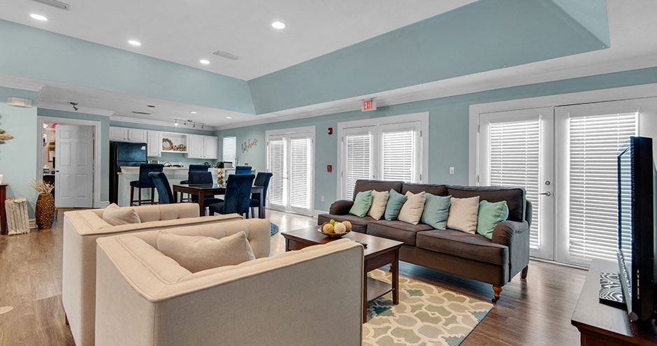 a living room with a couch and a table