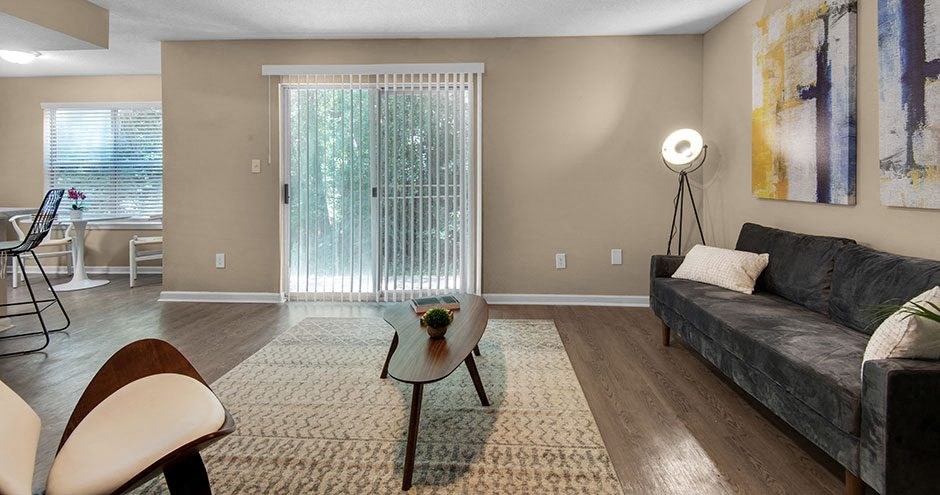 a living room with a couch and a table