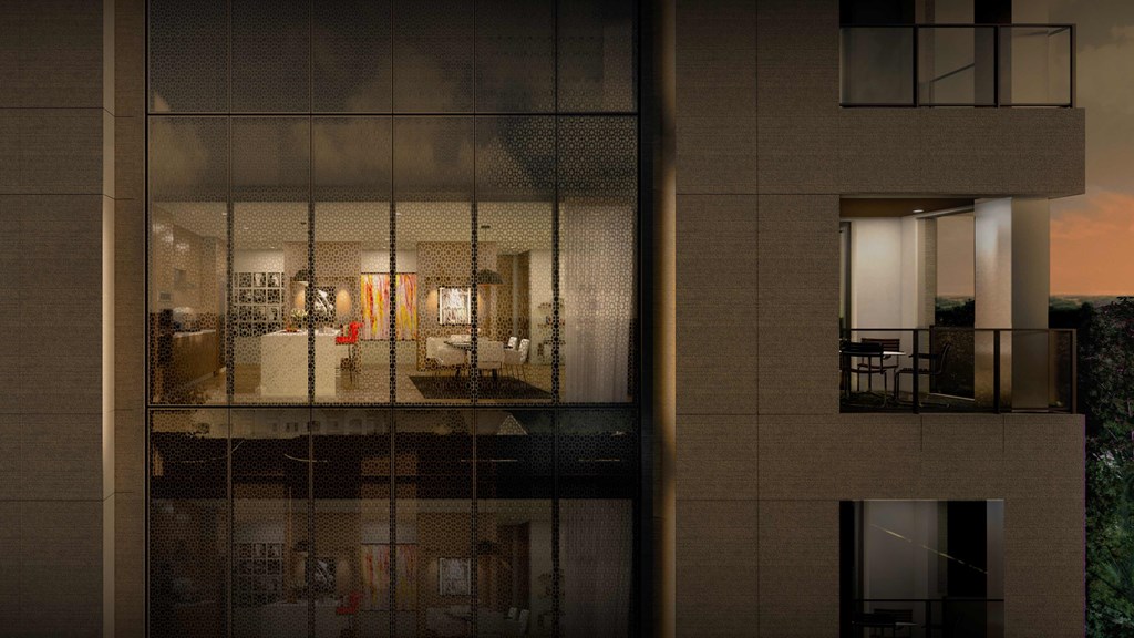 a view of a kitchen and a living room through a glass wall
