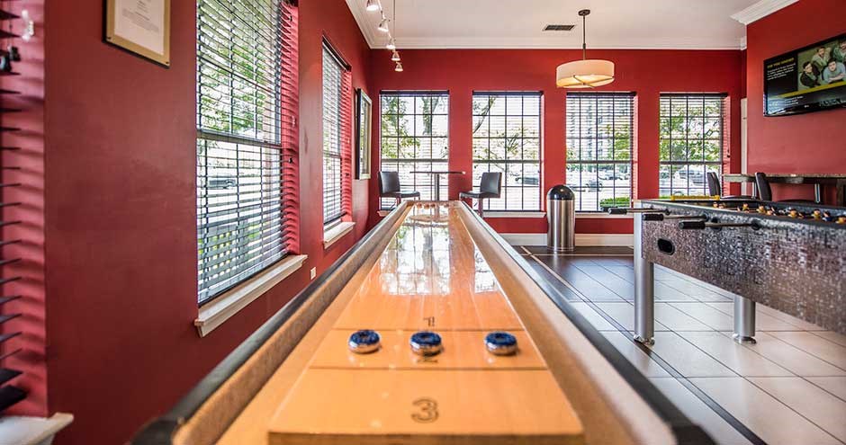 a bowling alley in a red room with red walls