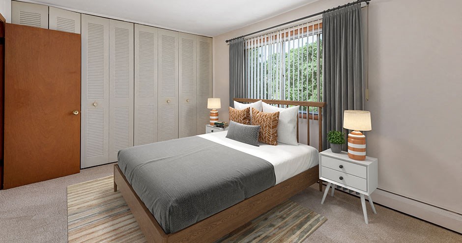 a bedroom with a bed and a closet