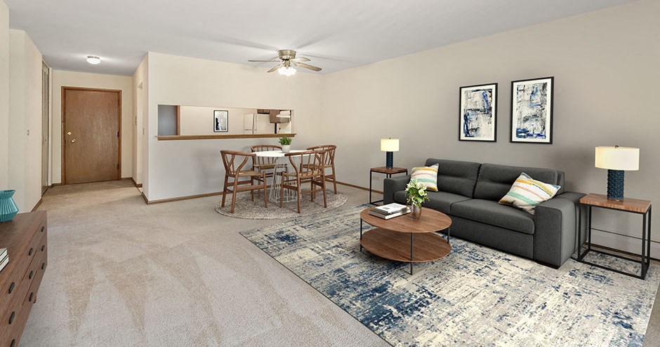 a living room with a couch and a table