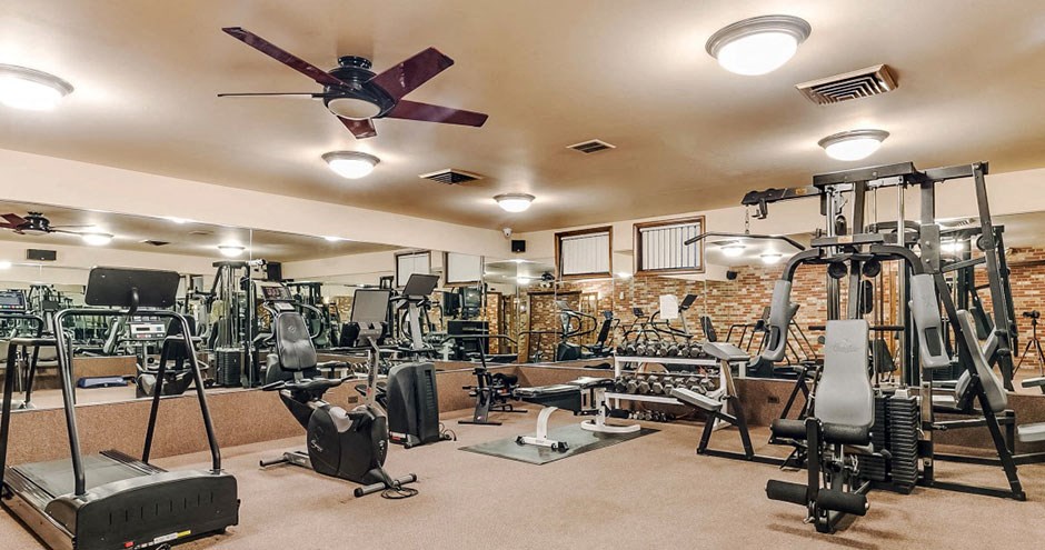 the gym is equipped with a variety of weights and cardio equipment