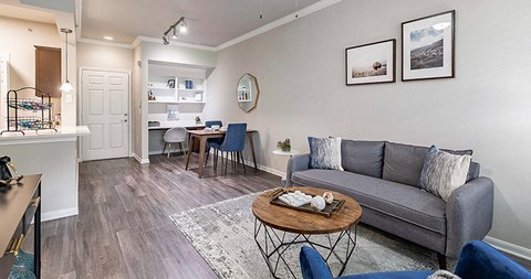 a living room with a couch and a table