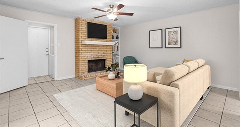 a living room with a couch and a fireplace