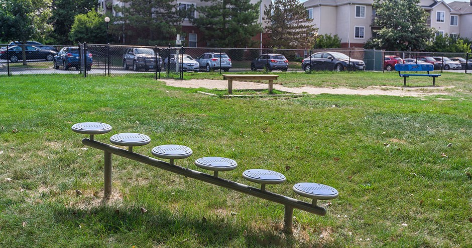 a group of benches in a park