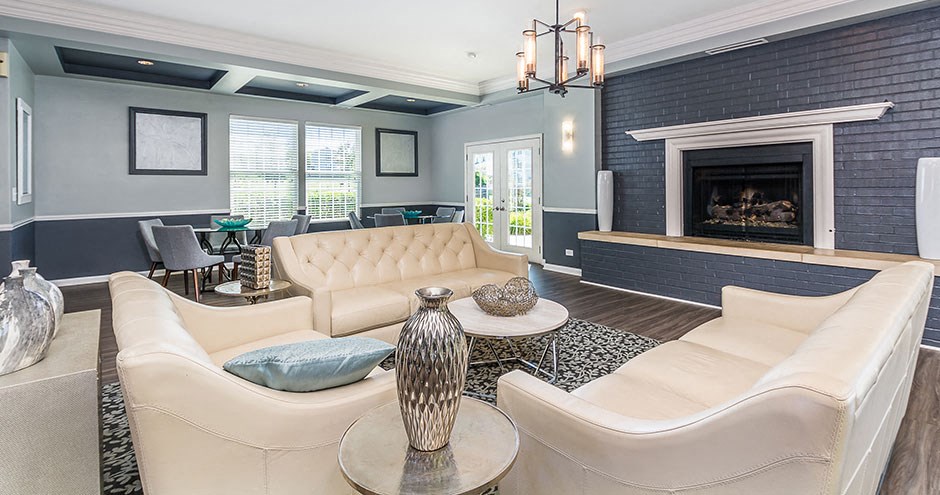 a living room with two couches and a fireplace