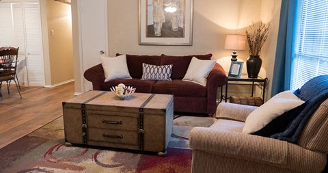 a living room with a couch and a coffee table