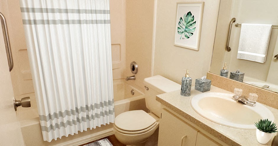 a bathroom with a sink toilet and a shower