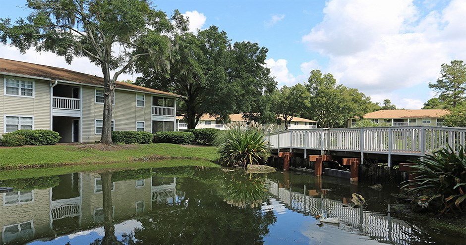 a building with a bridge over a body of water