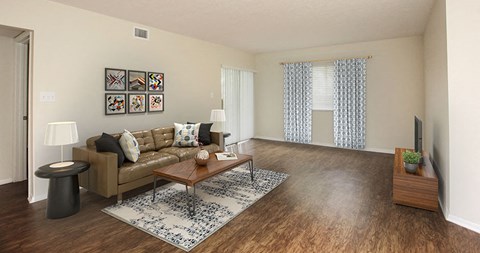 a living room with a couch and a table