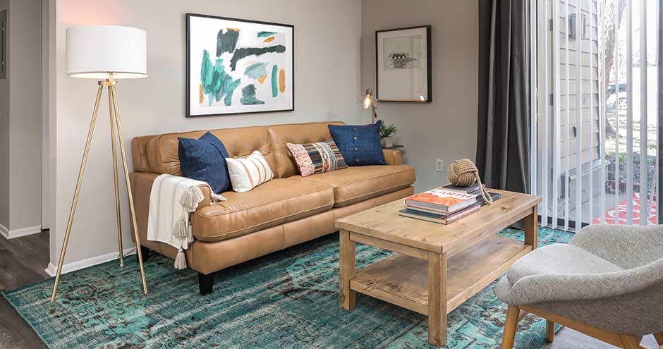 a living room with a couch and a coffee table