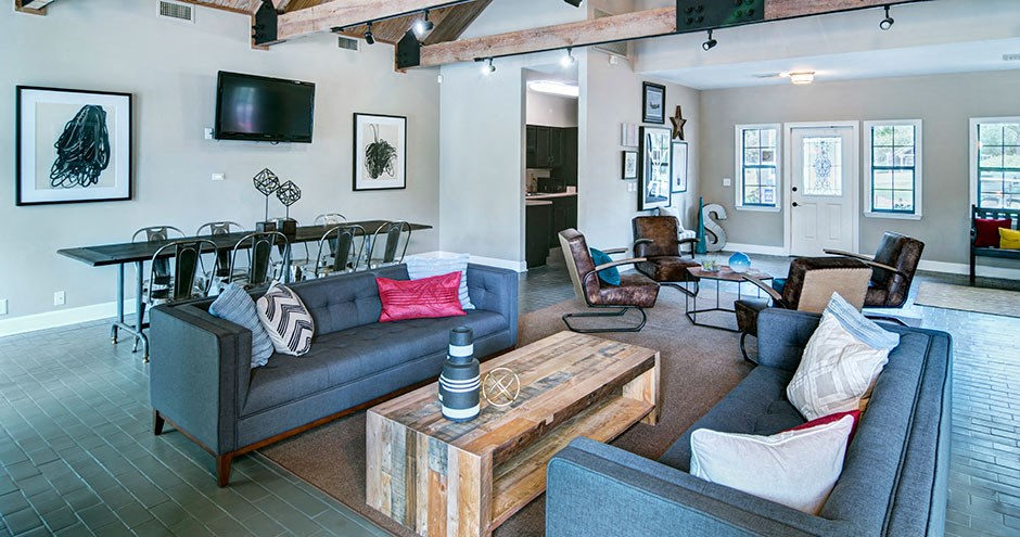 a living room with a couch and a table