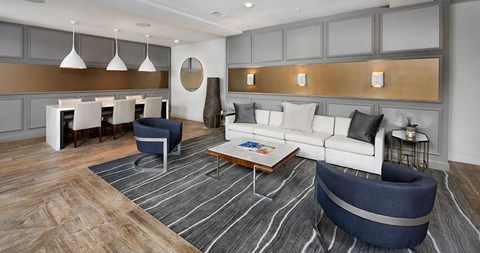 a living room and dining area in a hotel room
