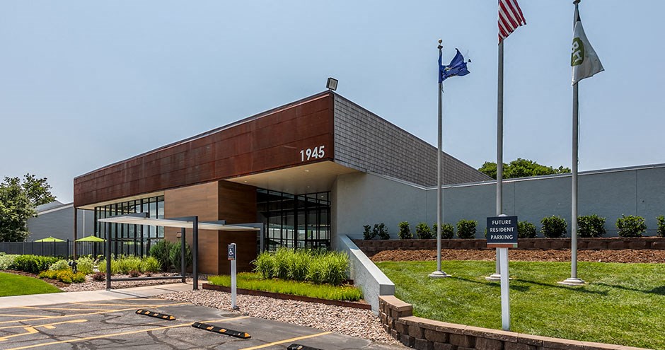 a building with flags in front of it