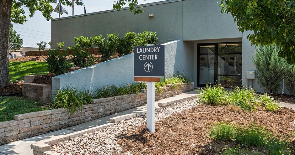 a sign in front of a building