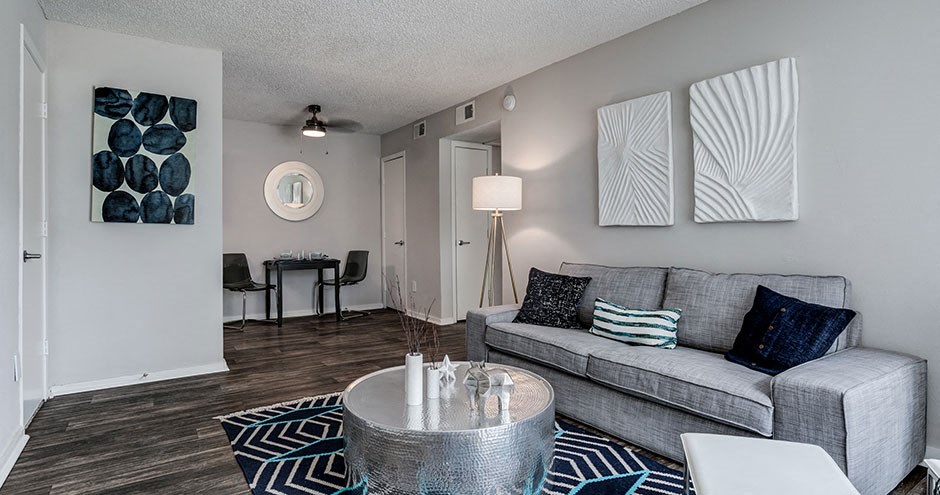 a living room with a couch and a table