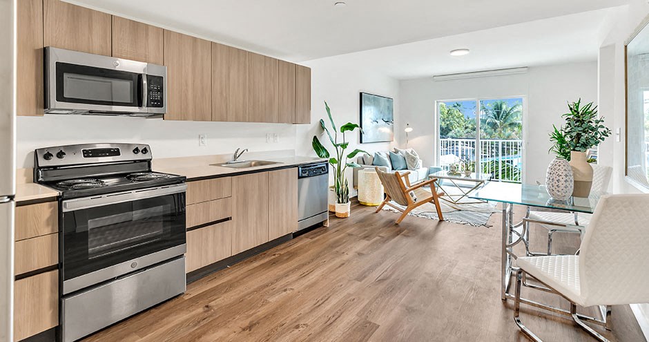 a kitchen with a stove and a microwave