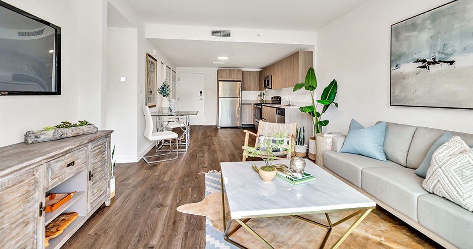 a living room with a couch and a table