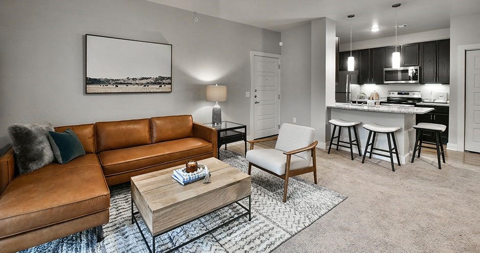 a living room with a couch and a table