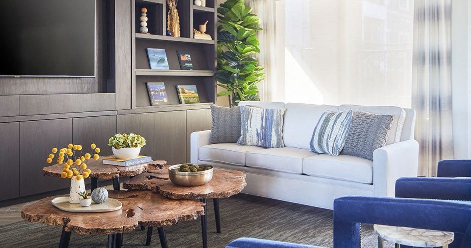 a living room with a couch and a table