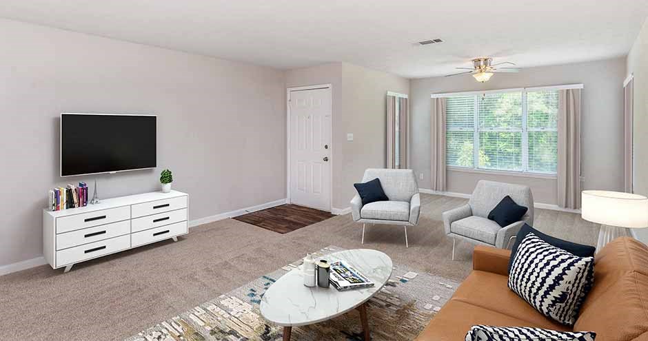 a living room with a couch and a television