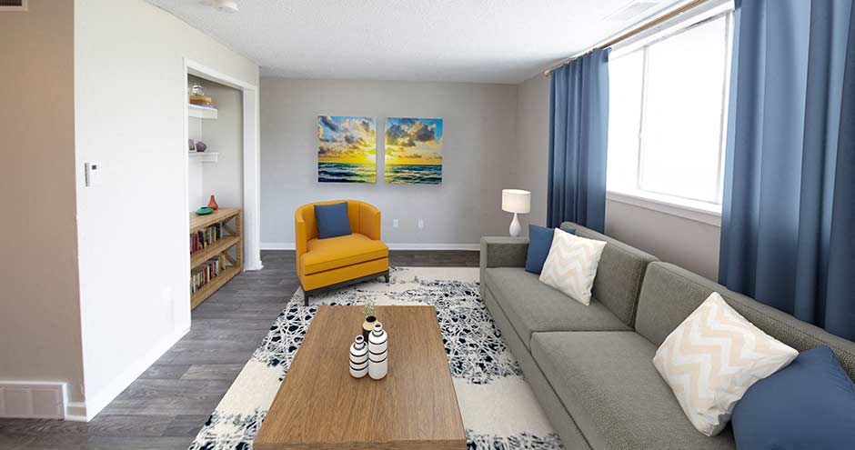 a living room with a couch and a table