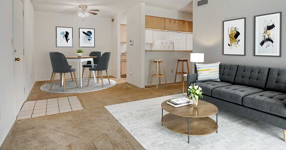 a living room with a couch and a table