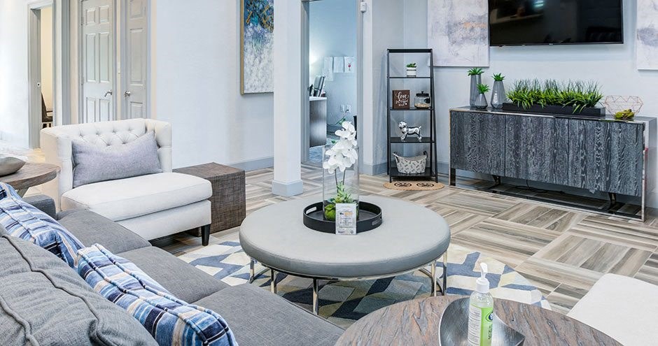 a living room with a couch and a table