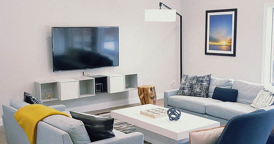 a living room with a couch and a television