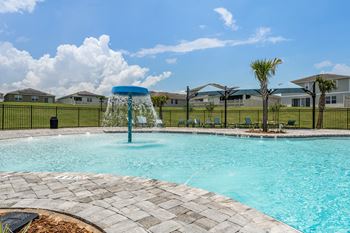 take a dip in the resort style pool at the enclave at woodbridge apartments in sugar land