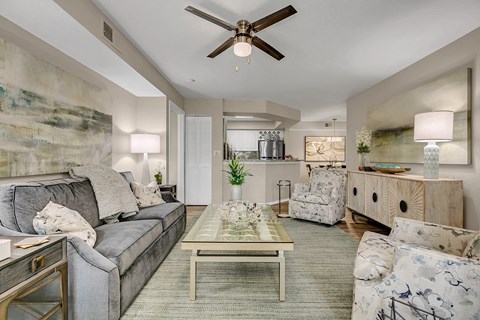 a living room with couches and a coffee table