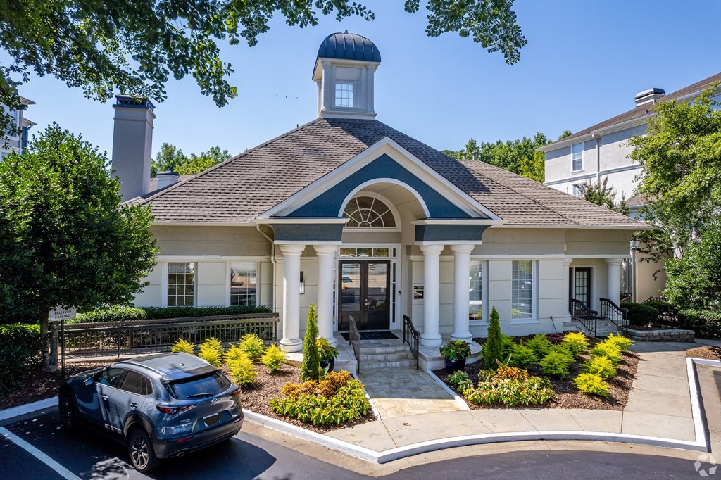 a house with a car parked in front of it