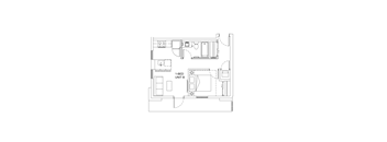 A floor plan of a room with a bed, desk, and chair.