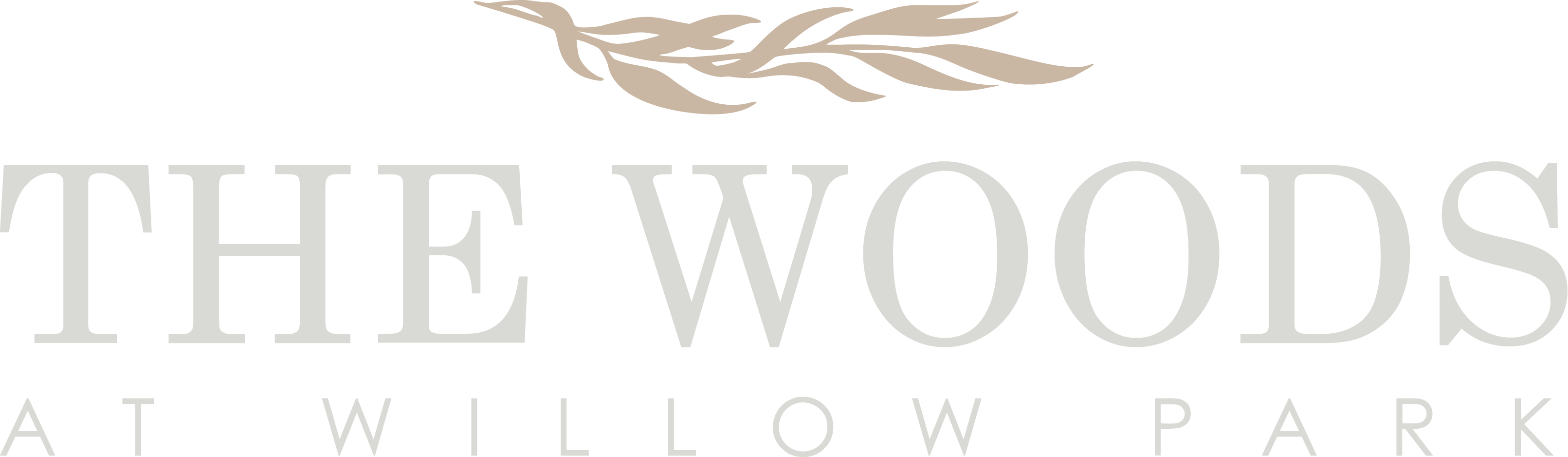 The image is a logo for "The Woods at Willow Park".