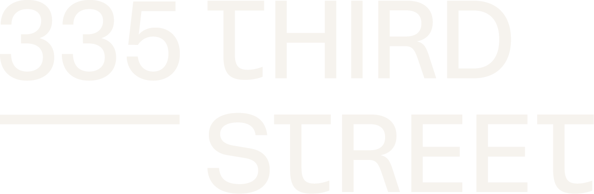 The image displays the text "335 THIRD STREET" in white on a green background.