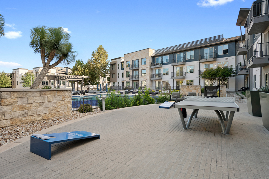 Austin apartments for rent near IBM - The Addison Apartments Outdoor kitchen with BBQ grills