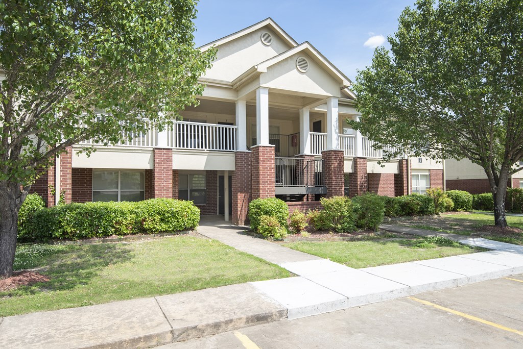 A two-story house with a white front porch.