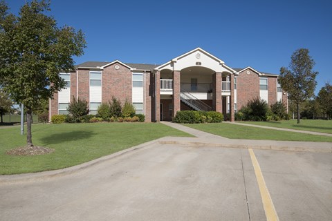 this is a picture of a building with a driveway