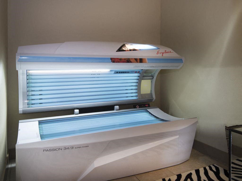 a refrigerator with its door open in a room