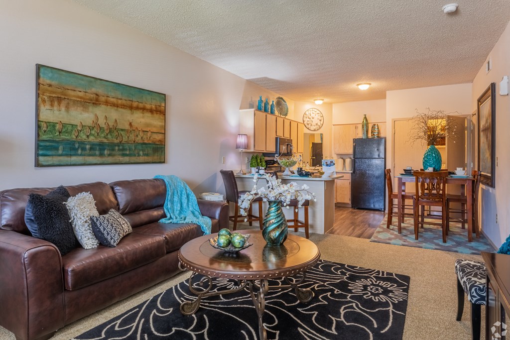 a living room with a couch and a table