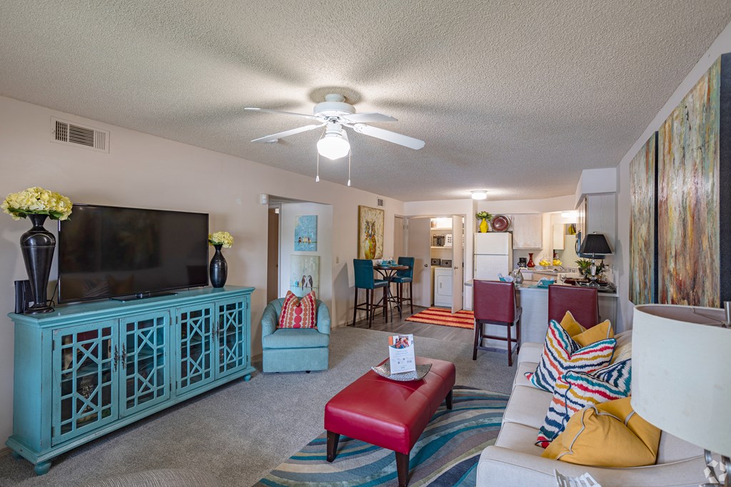 a living room with a couch and a tv