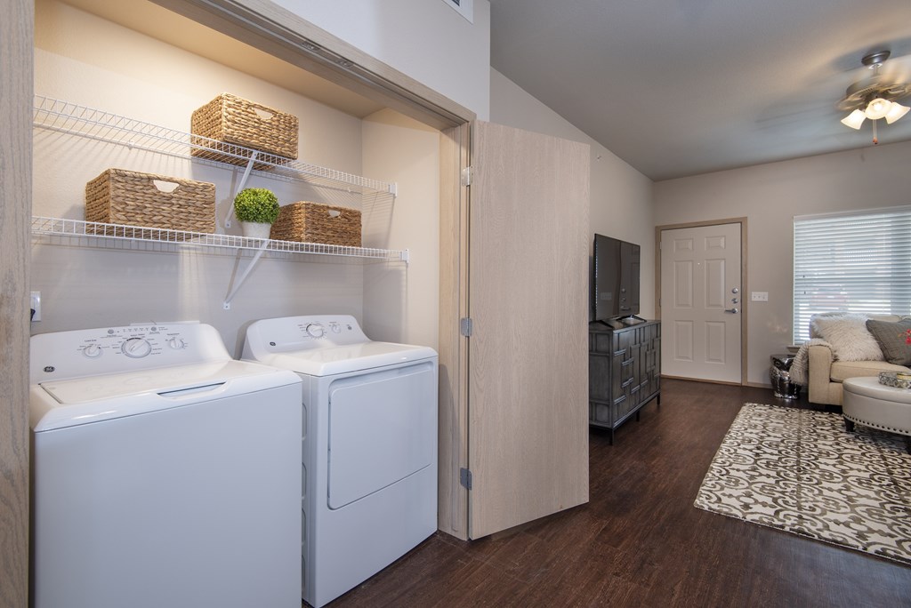 A laundry room with a washer and dryer.