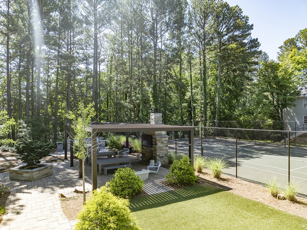 Seating area, grilling statin and tennis court