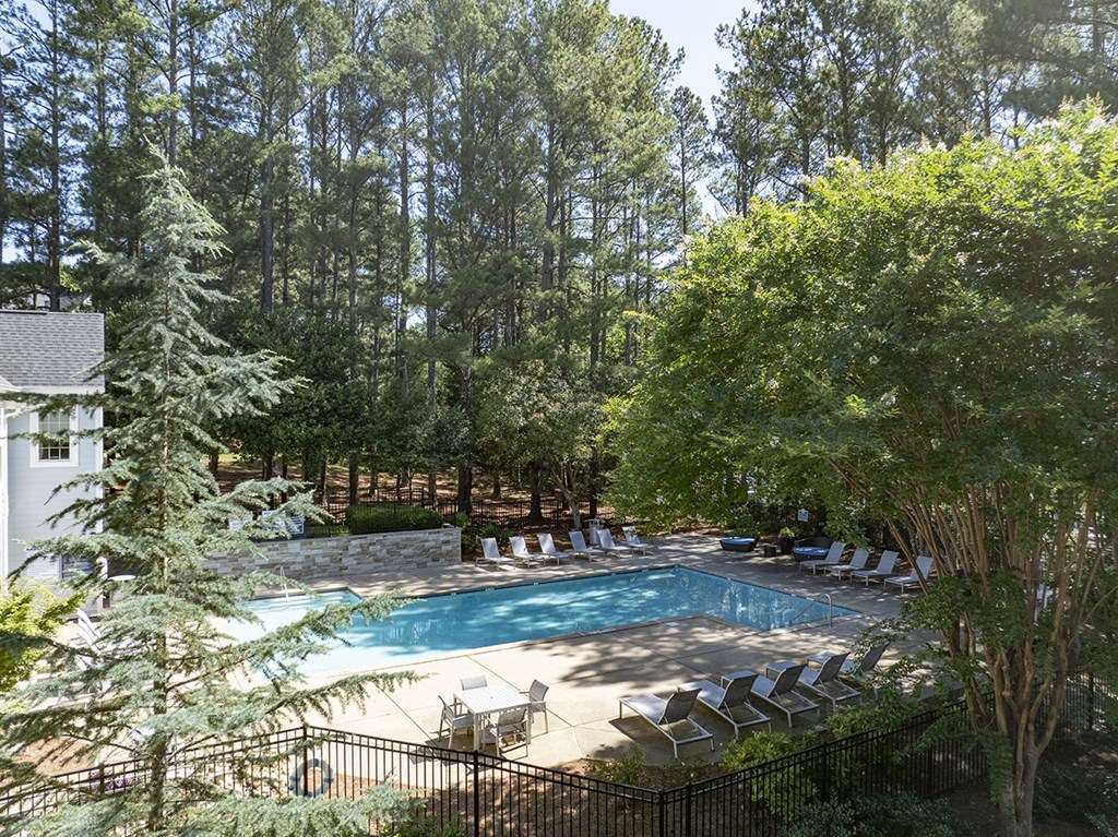 Pool deck with umbrellas and seating