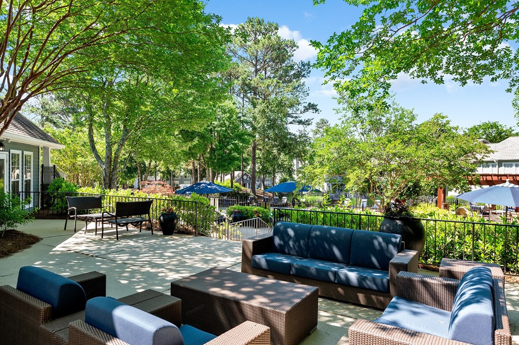 Patio with seating at Creekside at White Oak