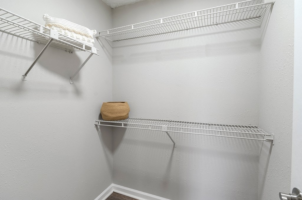 Spacious walk in closets in the bedrooms of our apartments