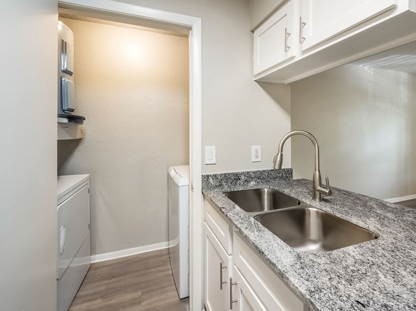 The Glades Kitchens featuring Granite Countertops The Glades kitchen